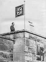 hitler, mussolini and stalin, giving speeches that were broadcast on the radio